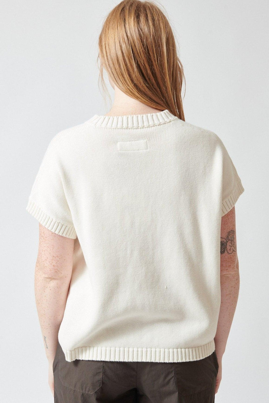 Waverly wearing Labo.Art Knit Octopus Vest rear view
