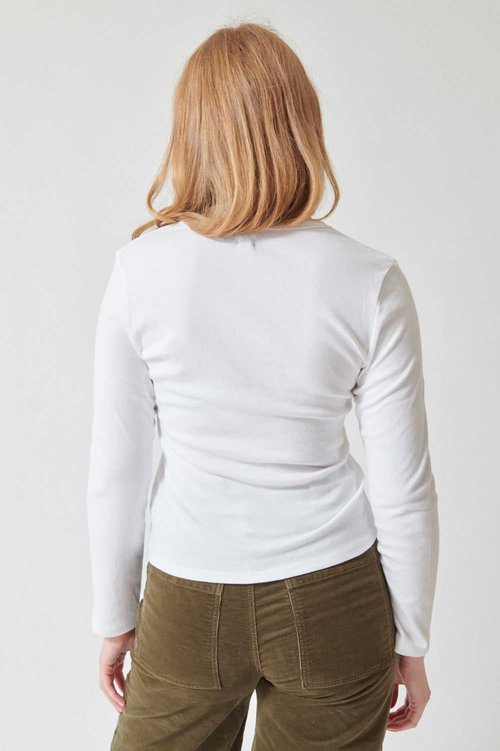 Waverly wearing LESET Nando Slim Fit Long Sleeve Tee, rear view