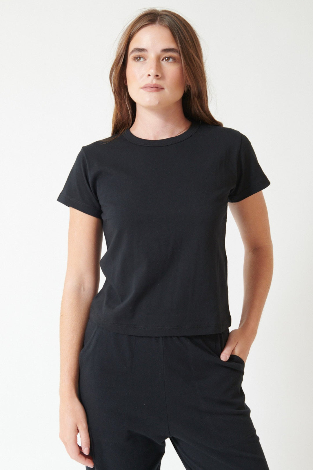 Julia wearing LESET The Margo Tee in black, front view.