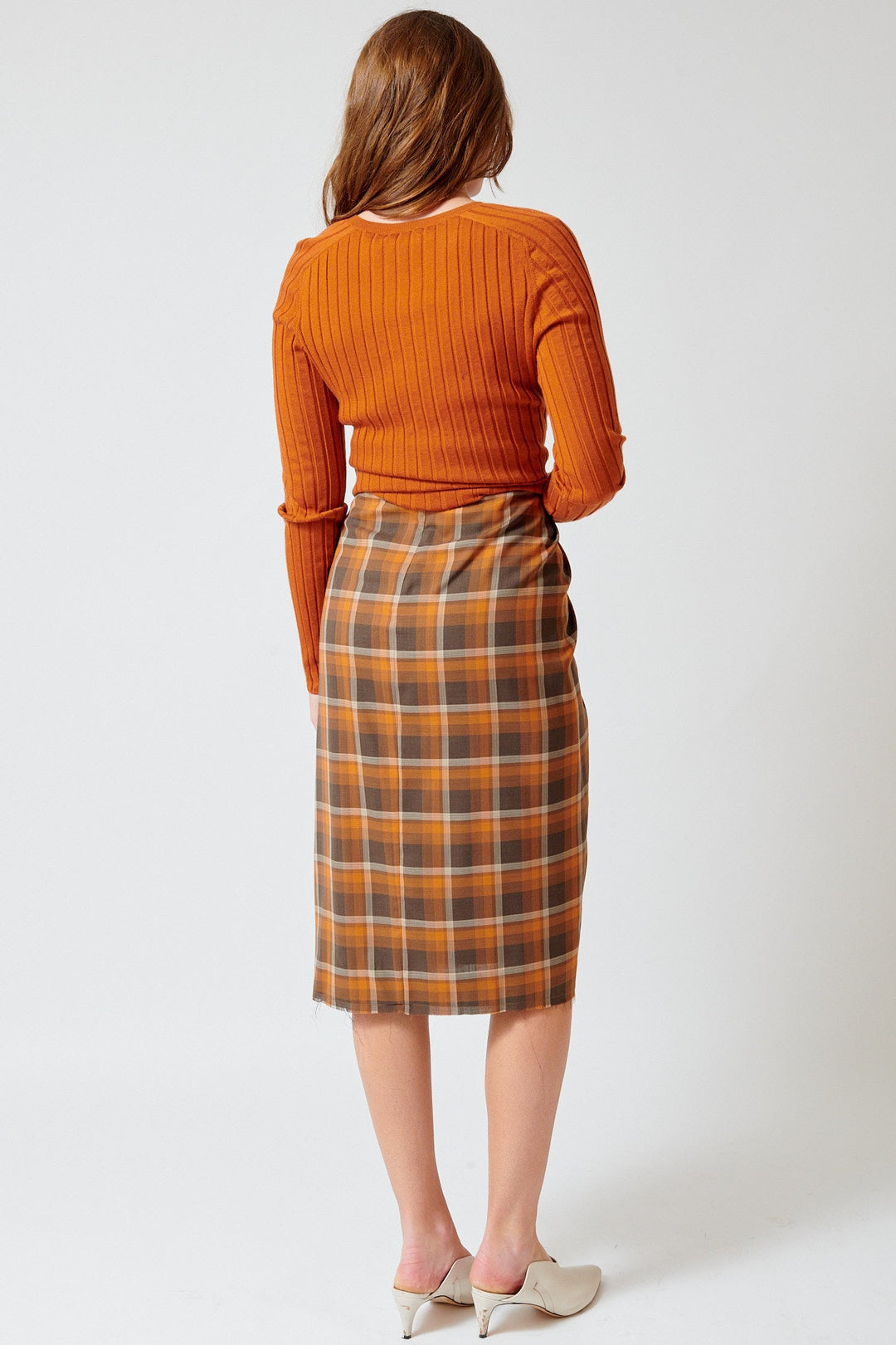 Julia wearing 6397 Draped Tartan Skirt rear view