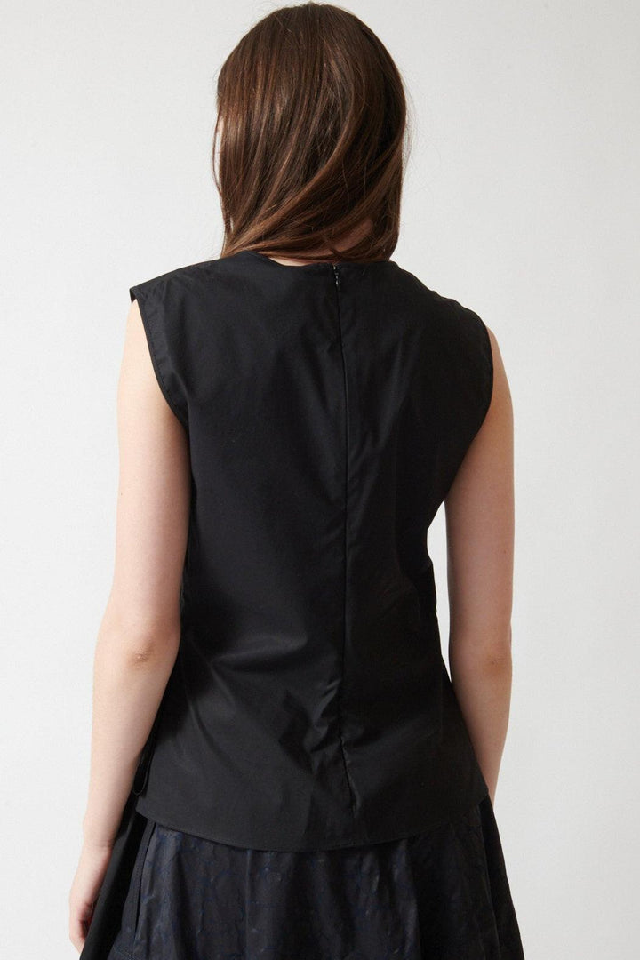 Angela wearing Mantu Dian Front Ribbon Top rear view