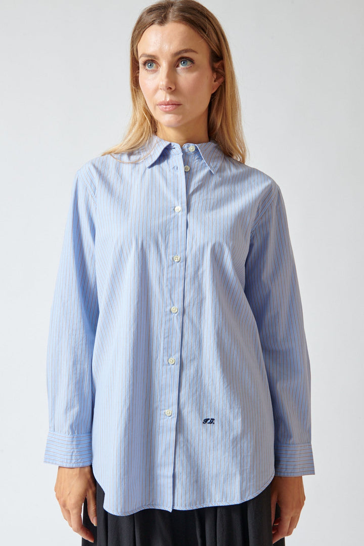 Mari wearing The Great The Menswear Button Up front view