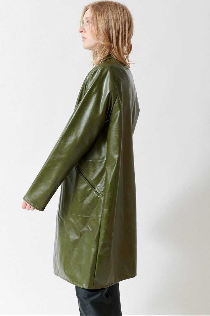 Madi wearing MM6 Maison Margiela Faux Leather Mid Length Jacket side view