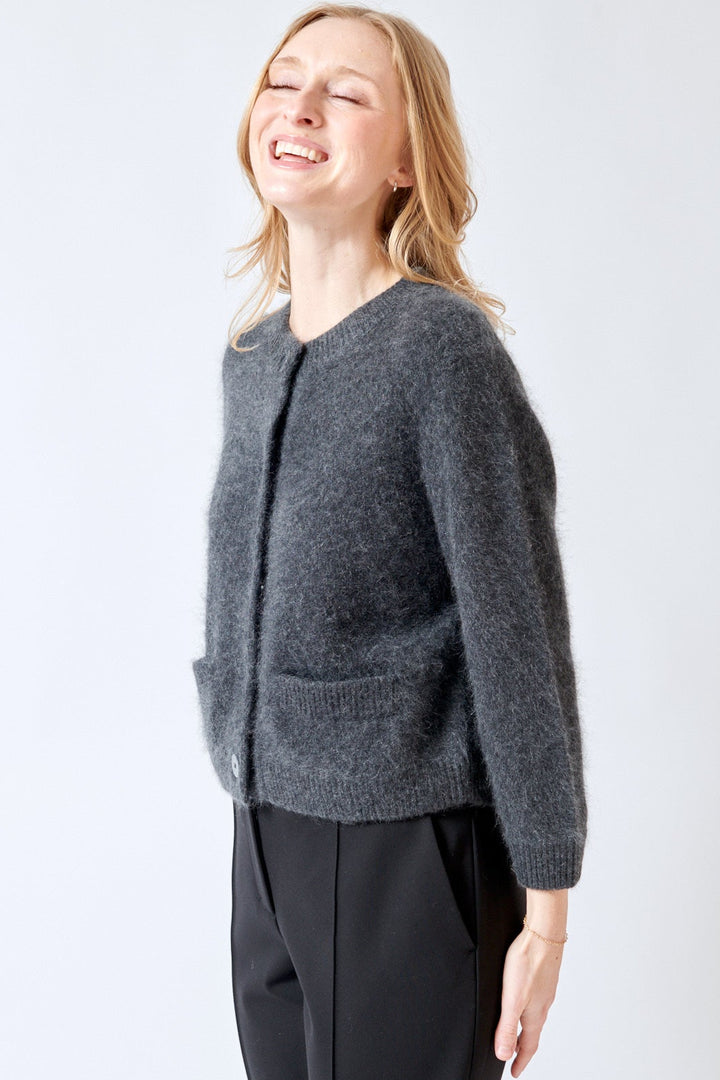 Madi wearing Dorothee Schumacher Fluffy Statements Cardigan front view