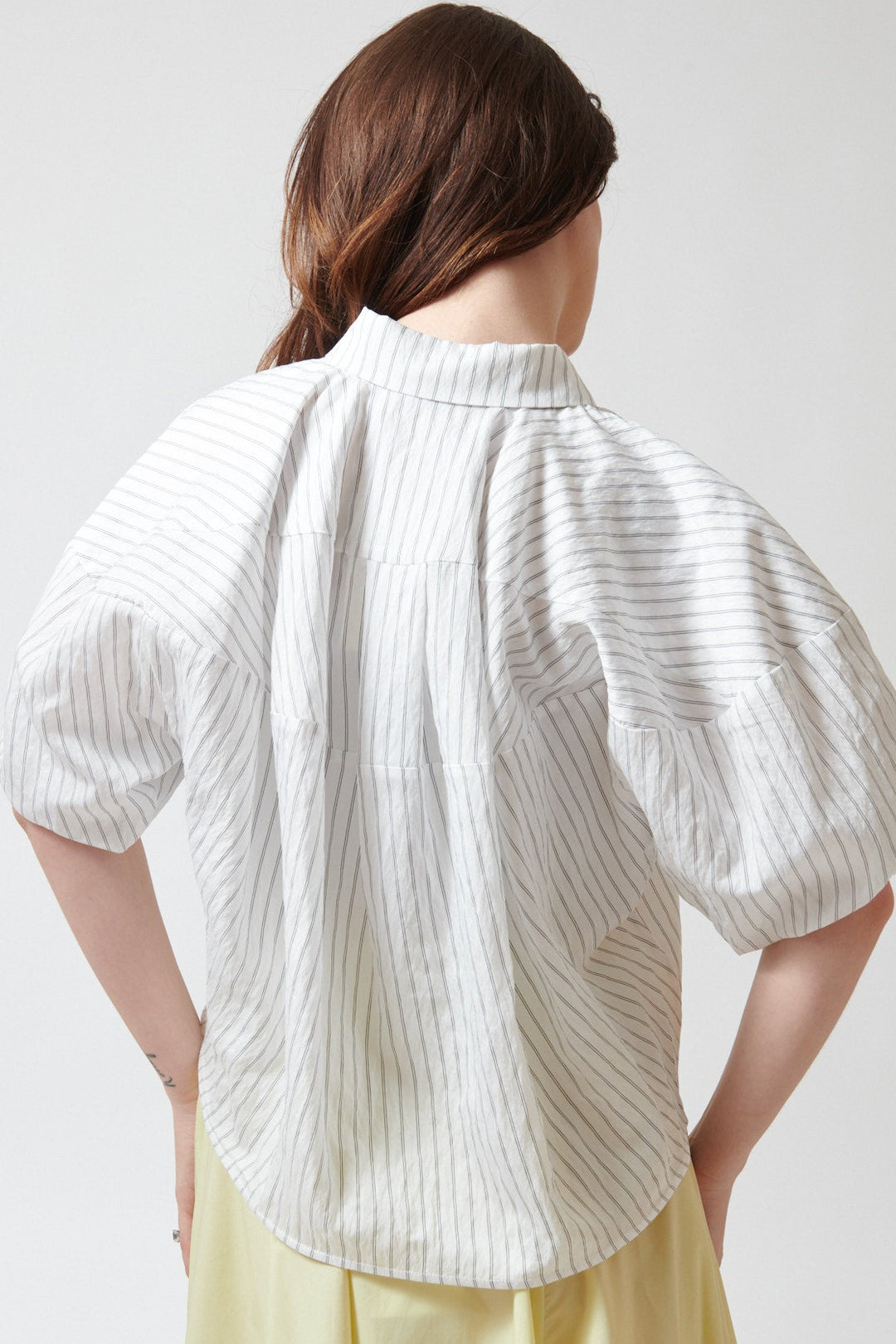 Sophie wearing Meimeij Circle Seamed Cool Blouse rear view
