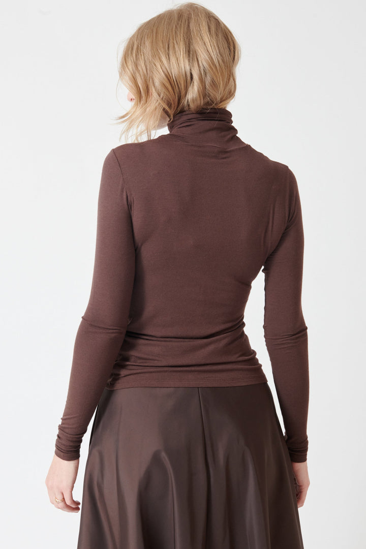Madi wearing Dorothee Schumacher Chic Comfort Shirt rear view