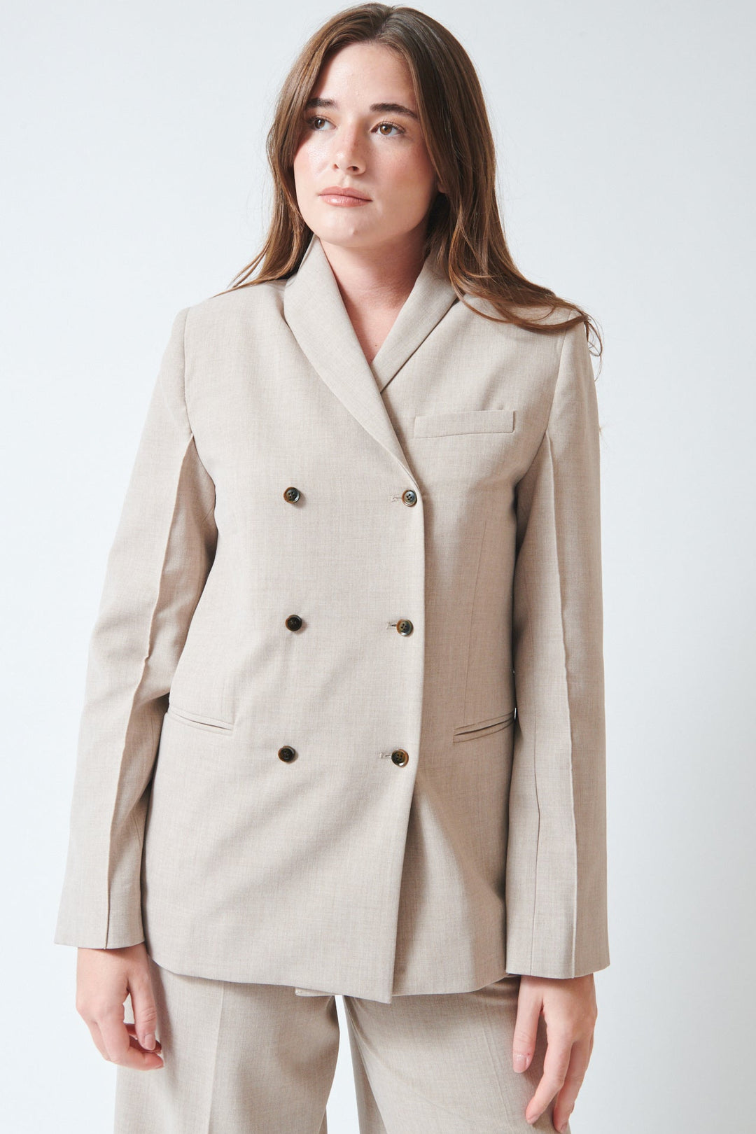 Julia wearing The Garment Pisano Tuxedo Beige Melange front view