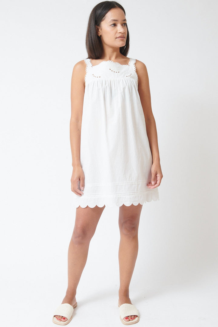 Amanda wearing The Garment Kirsten Babydoll Dress White front view