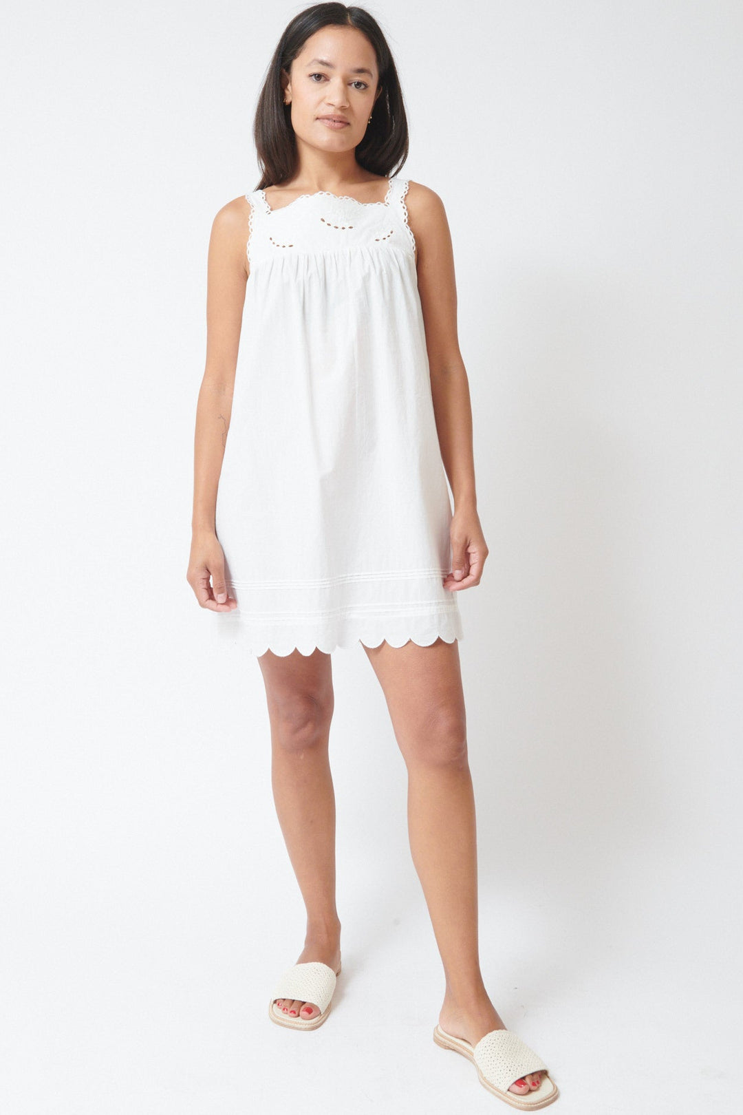 Amanda wearing The Garment Kirsten Babydoll Dress White front view