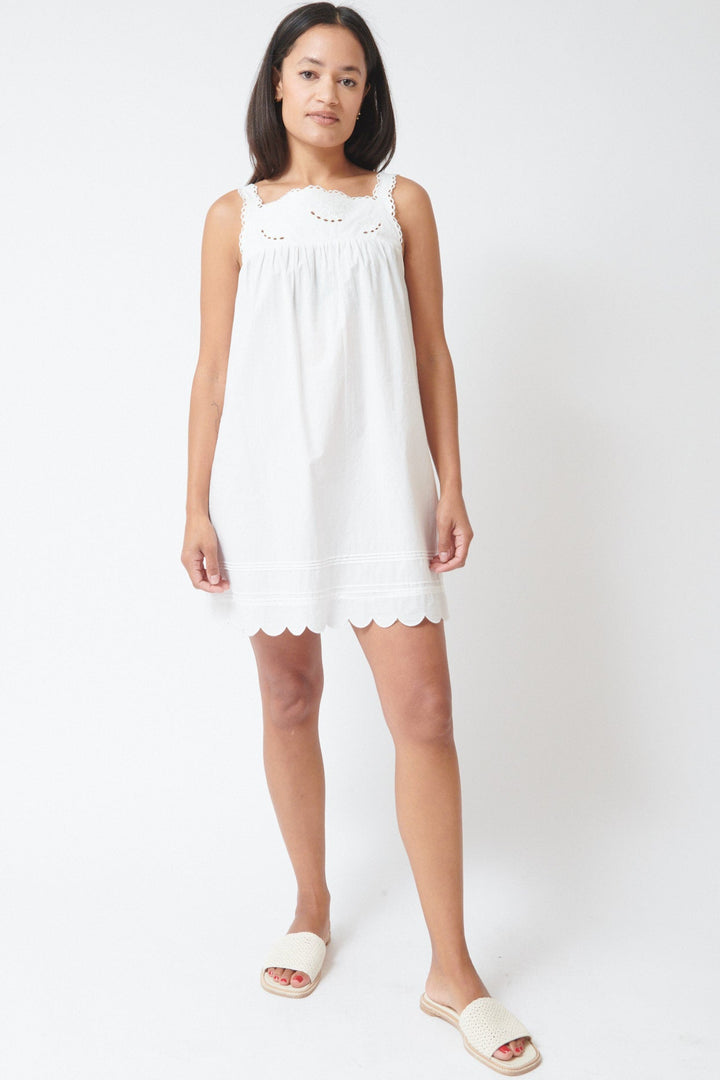 Amanda wearing The Garment Kirsten Babydoll Dress White front view