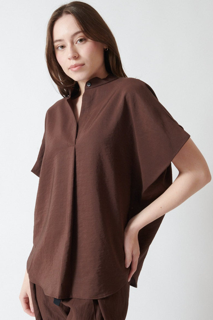 Angela wearing Zero + Maria Cornejo Para Drape Mare Shirt front view