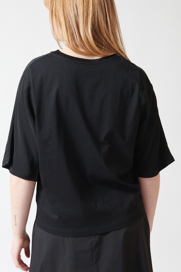 Waverly wearing Meimeij Acetate Silk Cool Tee rear view
