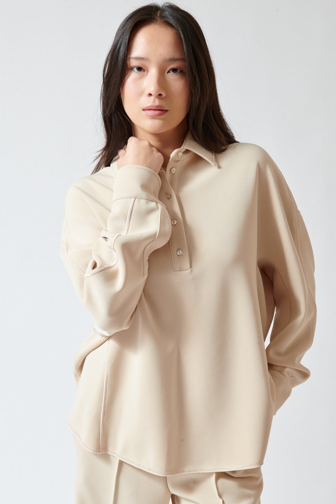 Lilly wearing Momoni Lilac Blouse front view