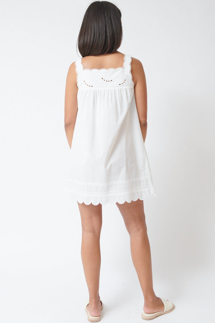 Amanda wearing The Garment Kirsten Babydoll Dress White rear view