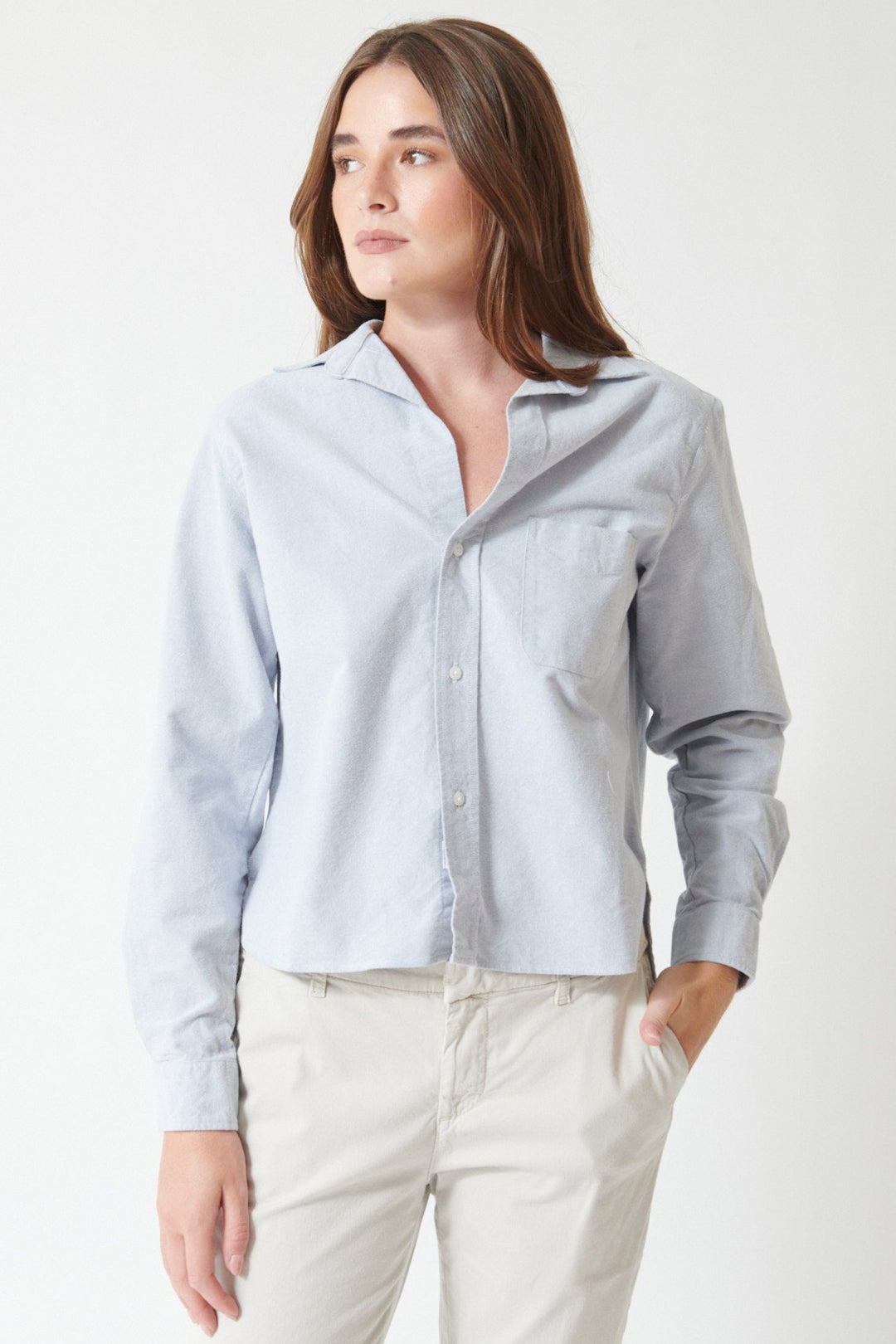 Julia wearing Frank & Eileen Silvio Untuckable Button Up Shirt in Indigo Oxford, front view.