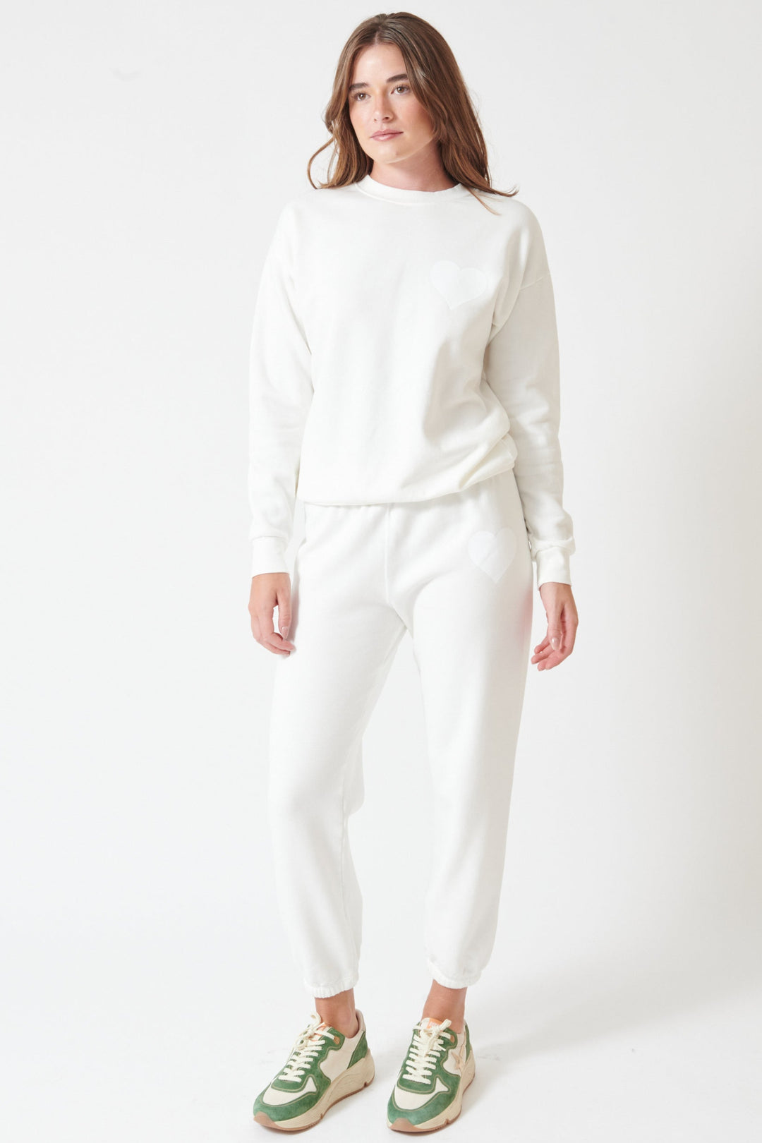 Julia wearing SPRWMN Heart Sweatpants front view