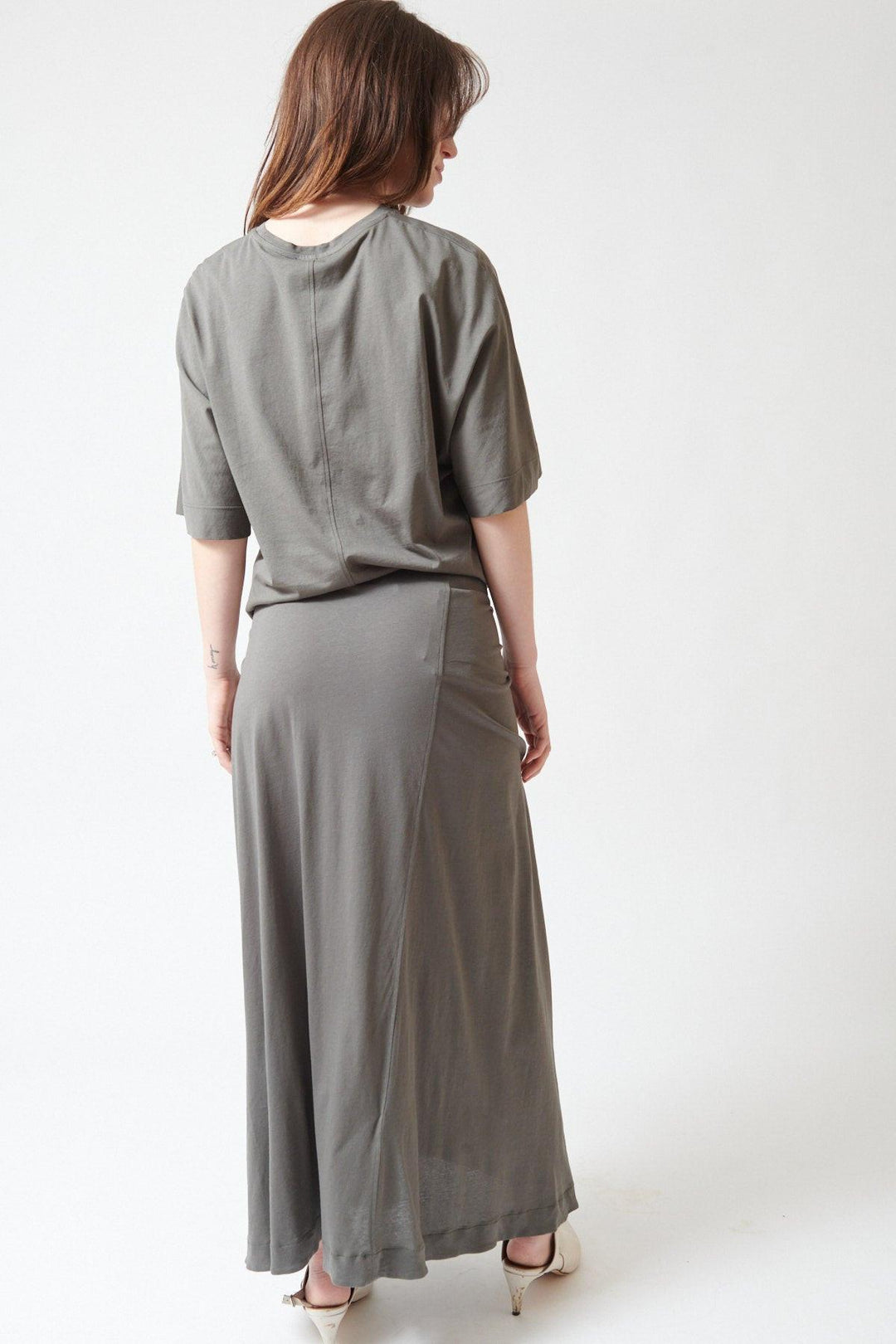 Sophie wearing Soeur Fluid Cotton Jersey Goa Wrap Skirt rear view