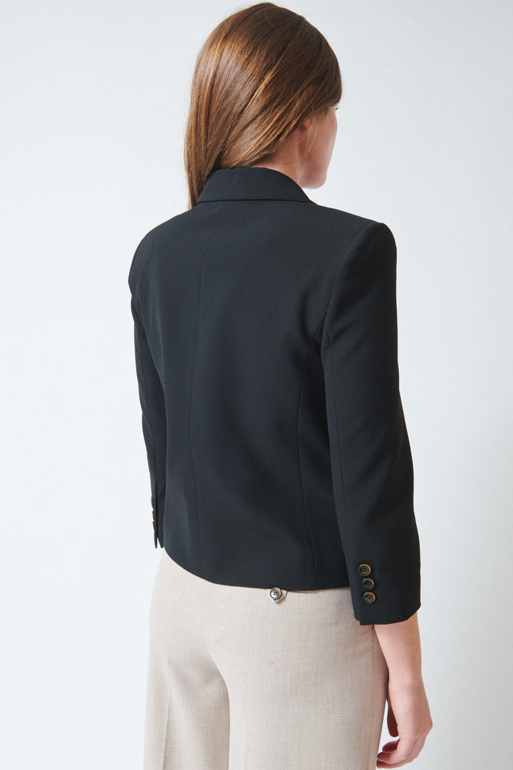 Julia wearing The Garment Pisano Fitted Jacket Black rear view