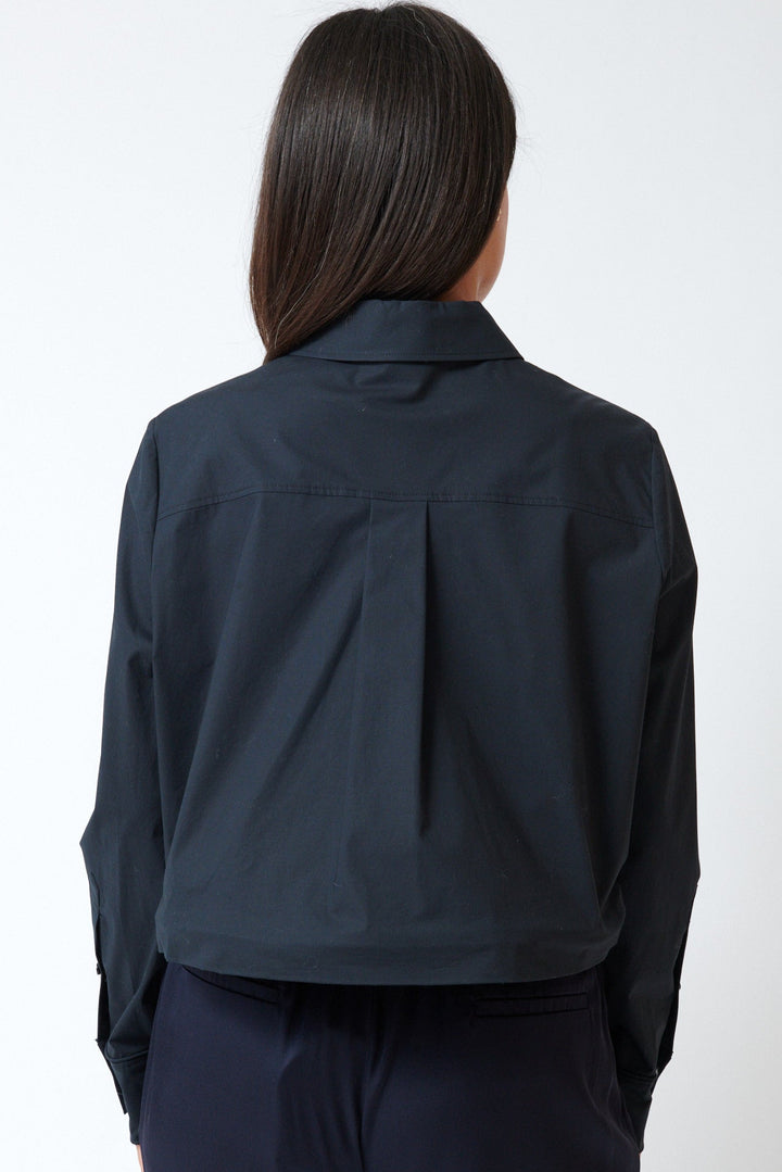 Amanda wearing Dorothee Schumacher Pure Power Blouse Pure rear view