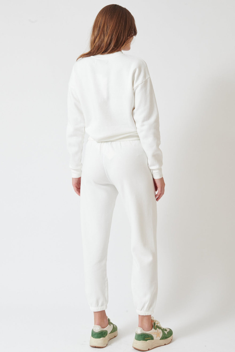 Julia wearing SPRWMN Heart Sweatpants rear view