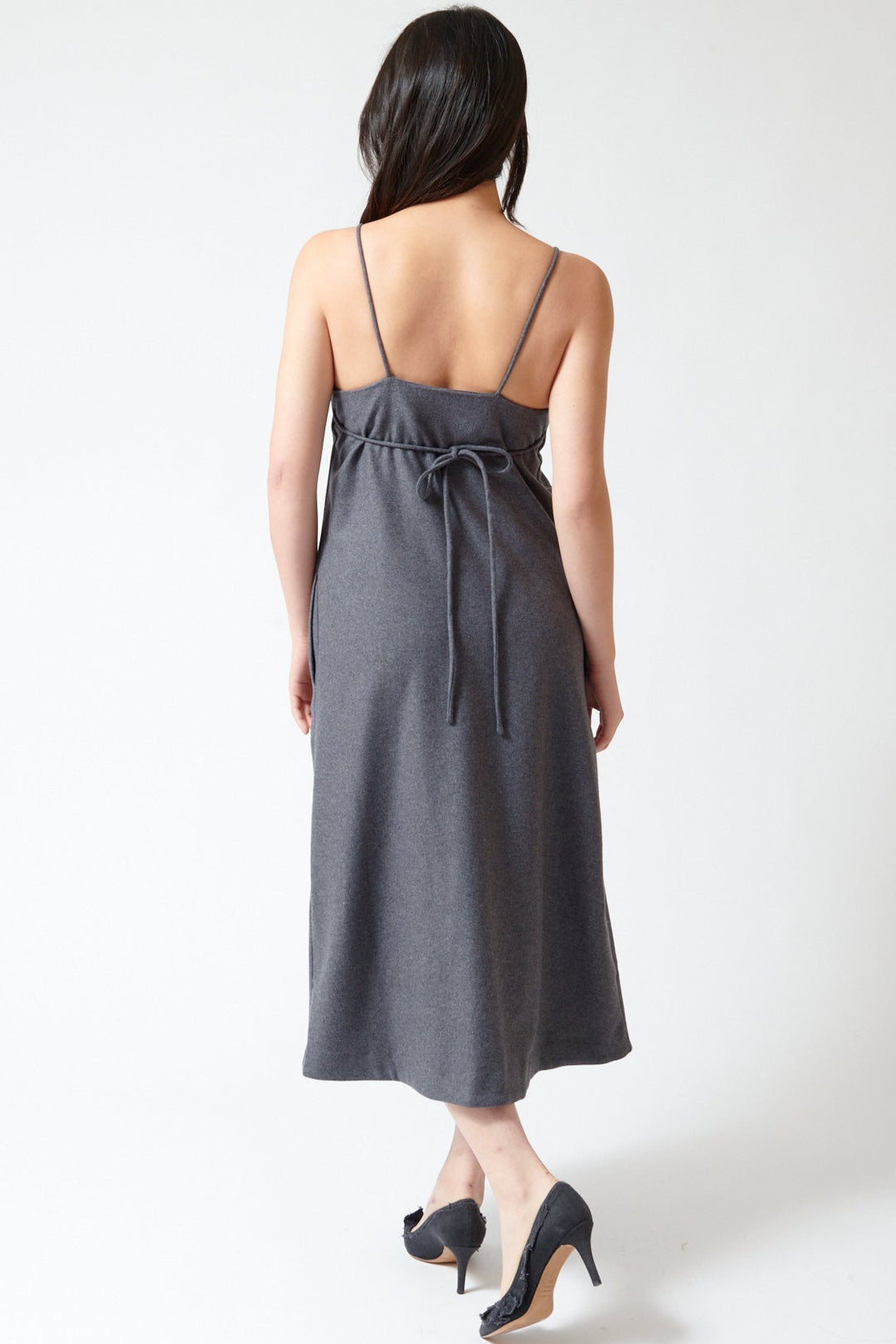 Lilly wearing The Garment Mitch Dress rear view