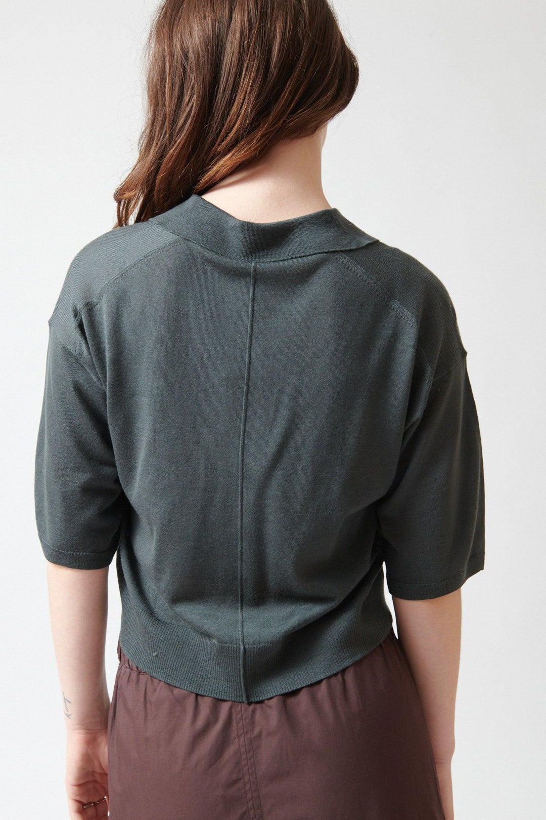 Sophie wearing Soeur Short Sleeved Merino Wool Elton Polo Grey Blue rear view