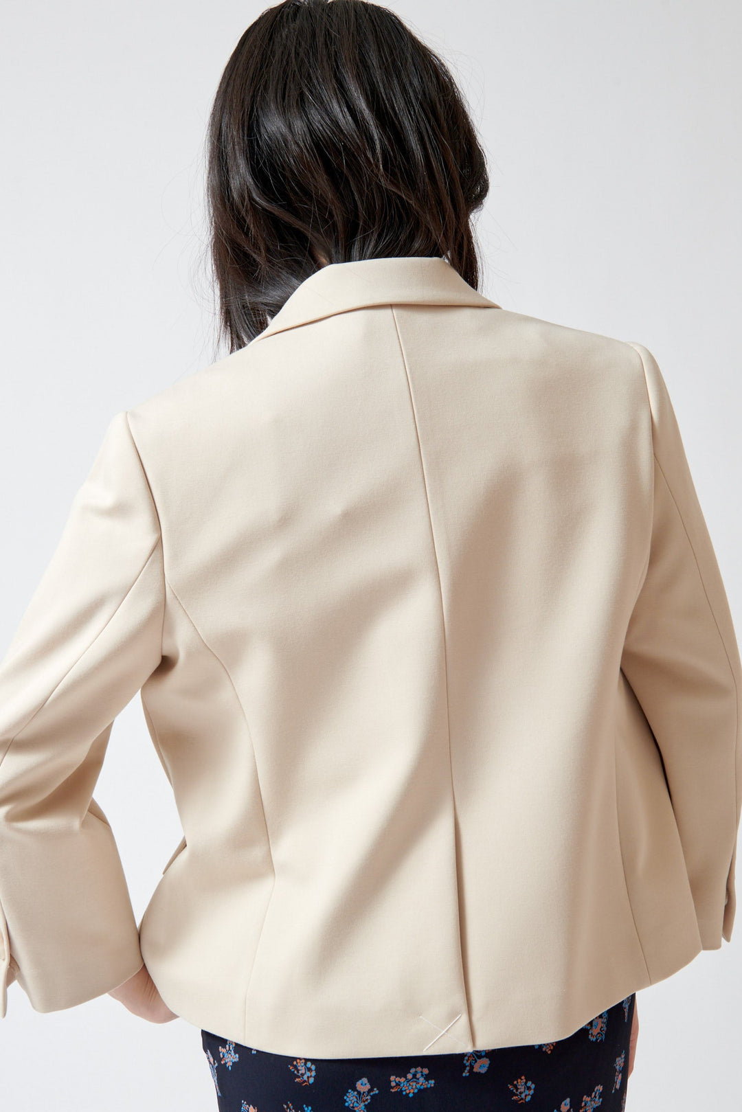 Lilly wearing Dorothee Schumacher Emotional Essence Jacket rear view
