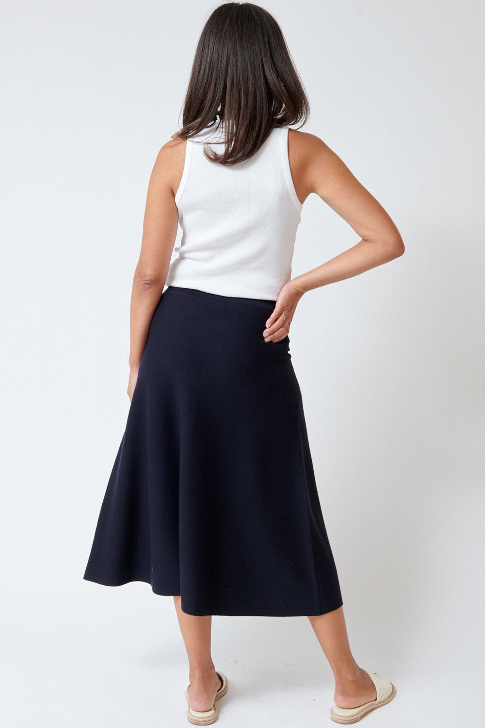Amanda wearing Allude Touch On Wool Skirt rear view