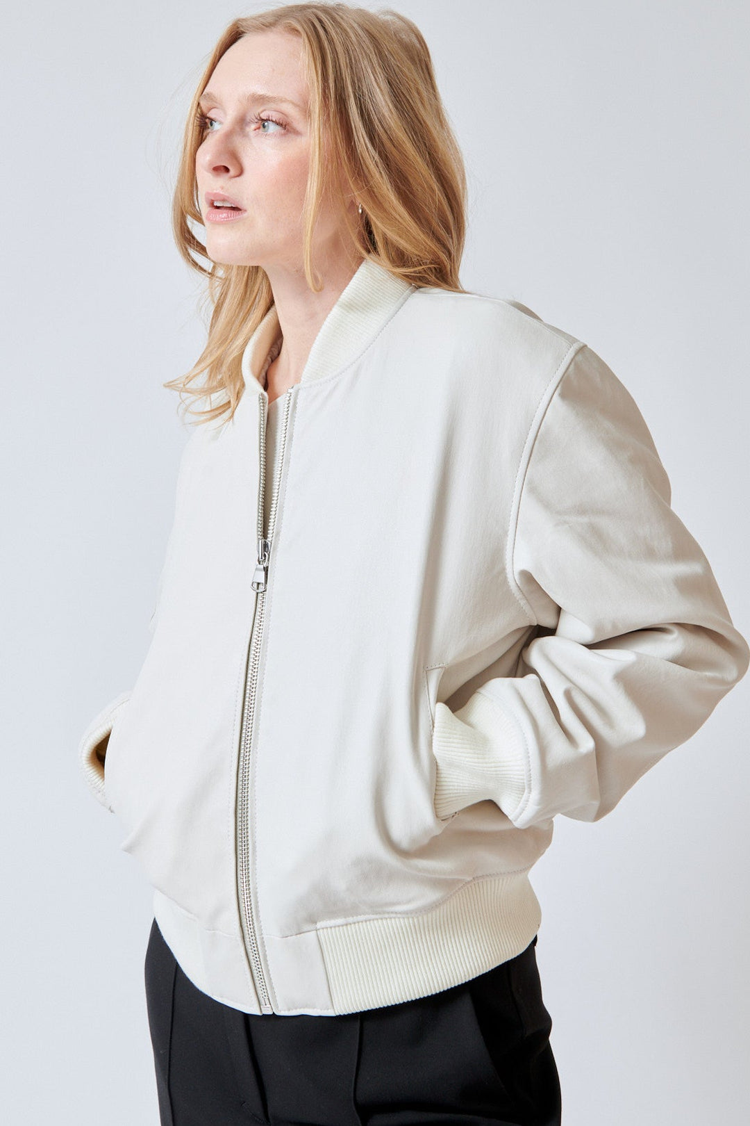 Maid wearing SPRWMN Bomber Jacket front view