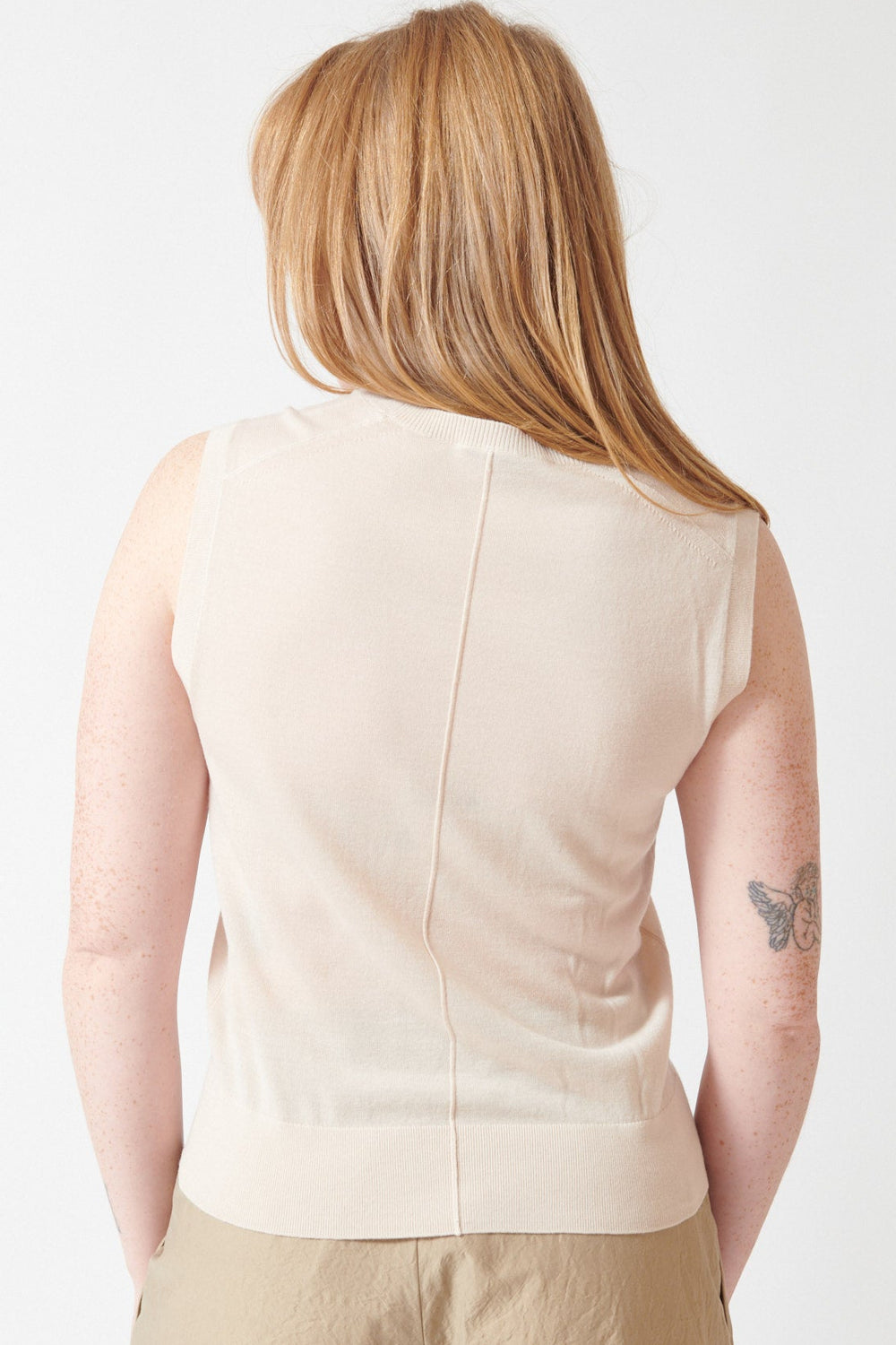 Waverly wearing Soeur Fine Merino Wool Sleeveless Fergie Jumper rear view