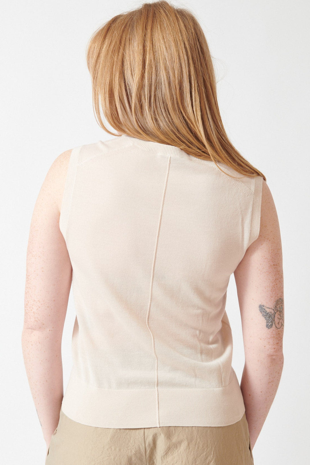 Waverly wearing Soeur Fine Merino Wool Sleeveless Fergie Jumper rear view