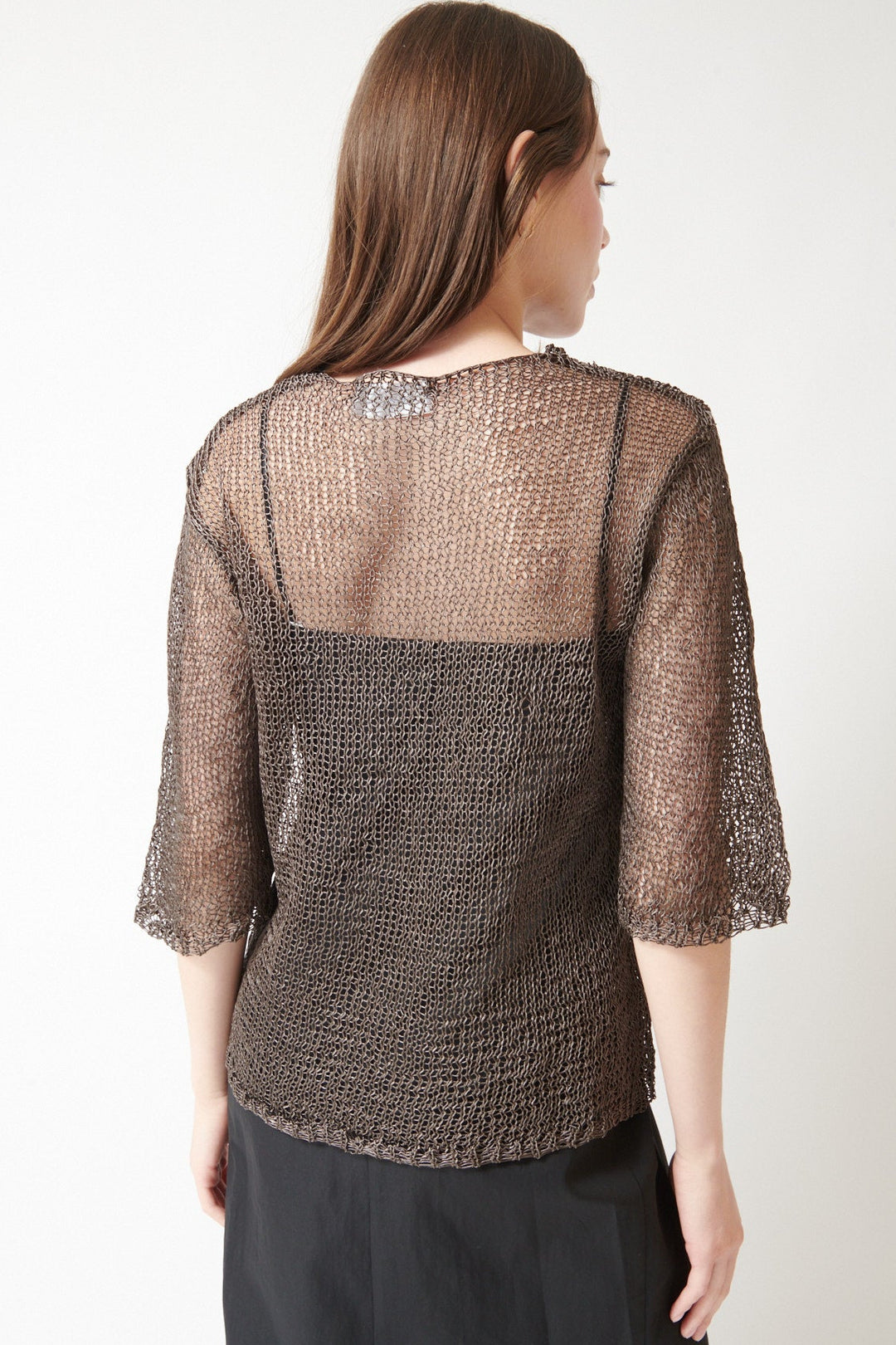 Angela wearing Christian Wijnants Kassim Top rear view