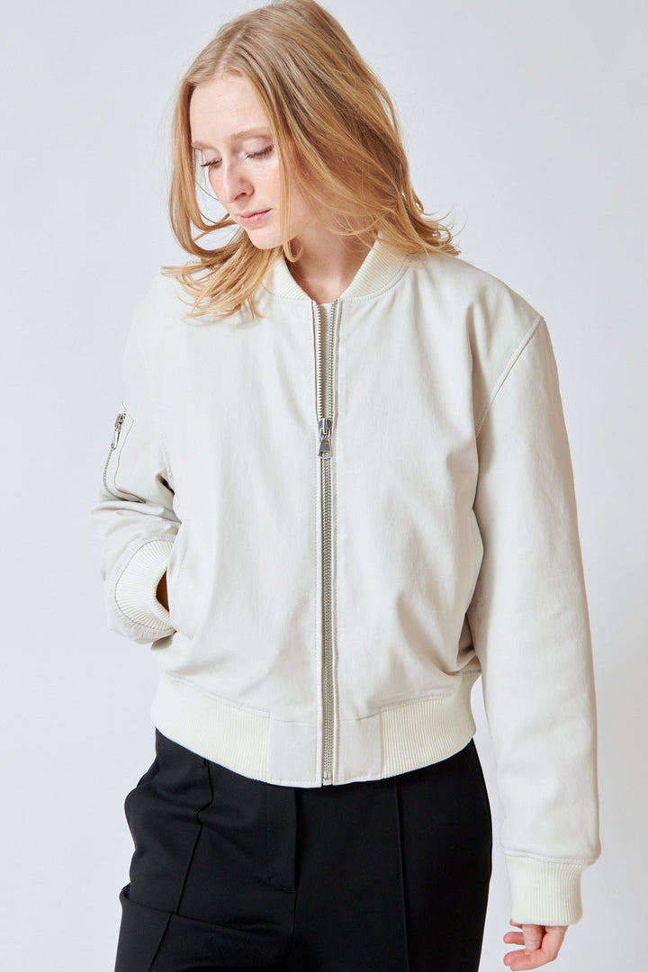 Maid wearing SPRWMN Bomber Jacket front view