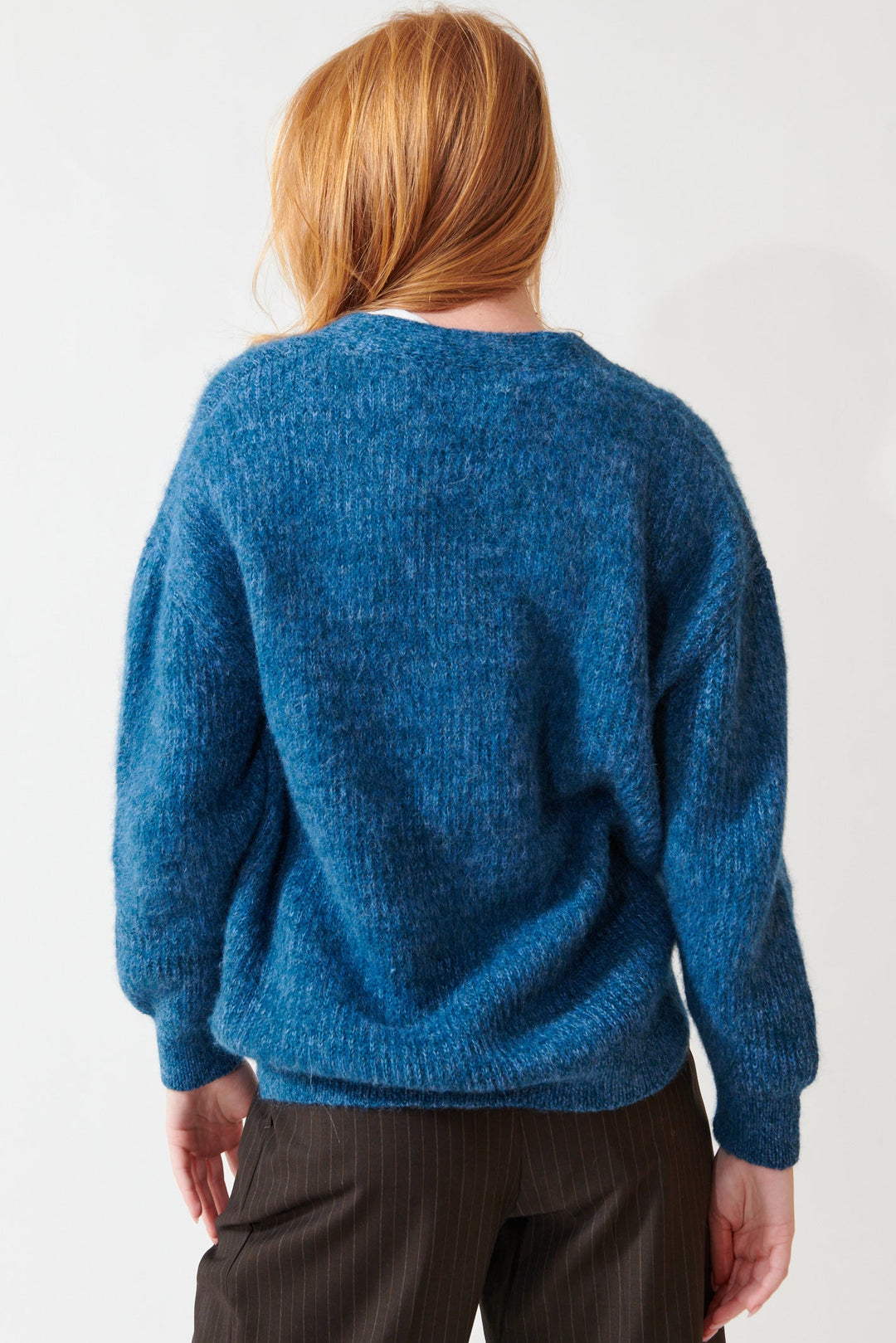 Aysia wearing The Great The Brushed Melange Cardigan rear view
