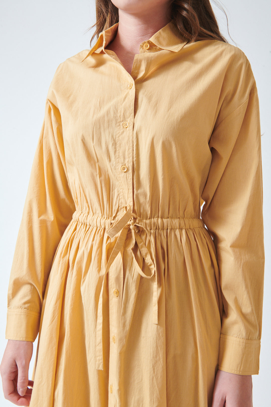 Julia wearing Apiece Apart Priska Shirt Dress front/detail view