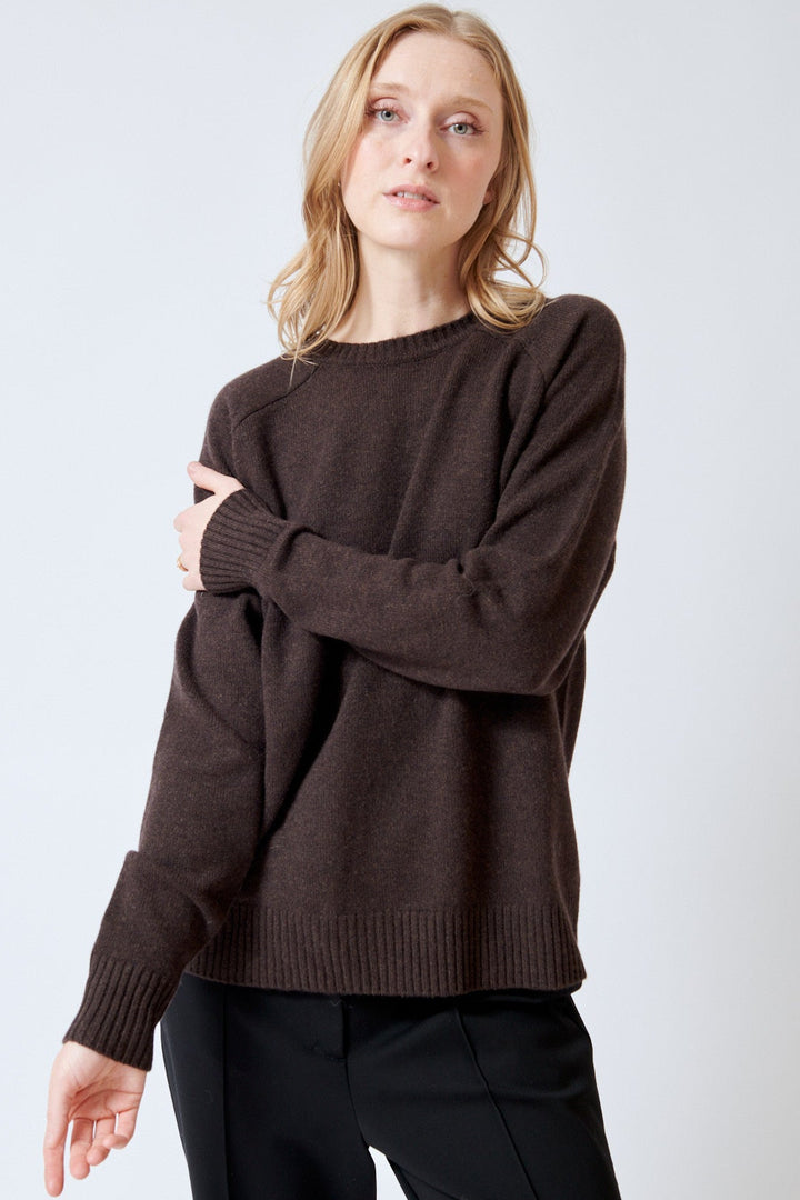 Madi wearing SPRWMN Classic Crew Sweater front view