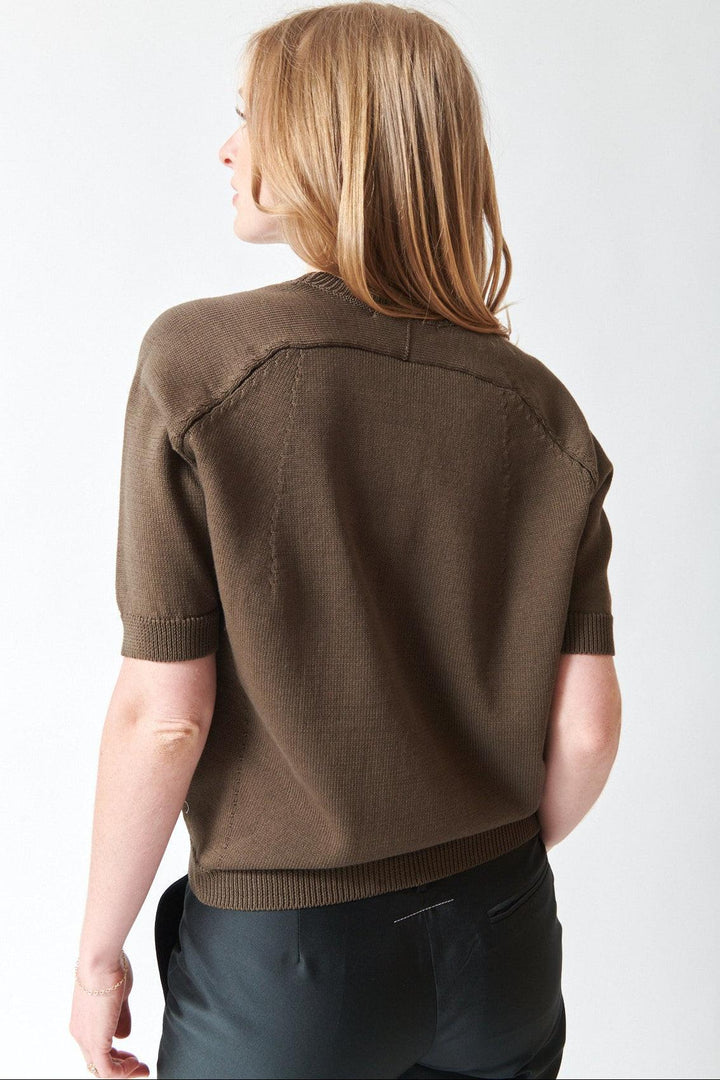 Madi wearing Christian Wijnants Kondo Top cement rear view