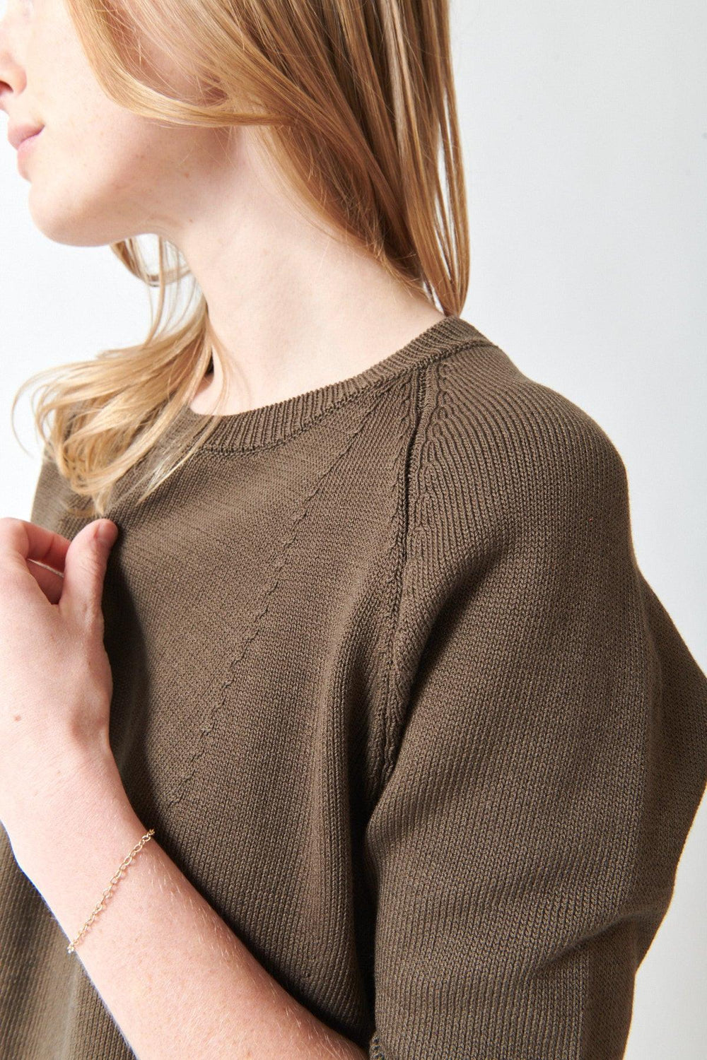 Madi wearing Christian Wijnants Kondo Top cement detail view