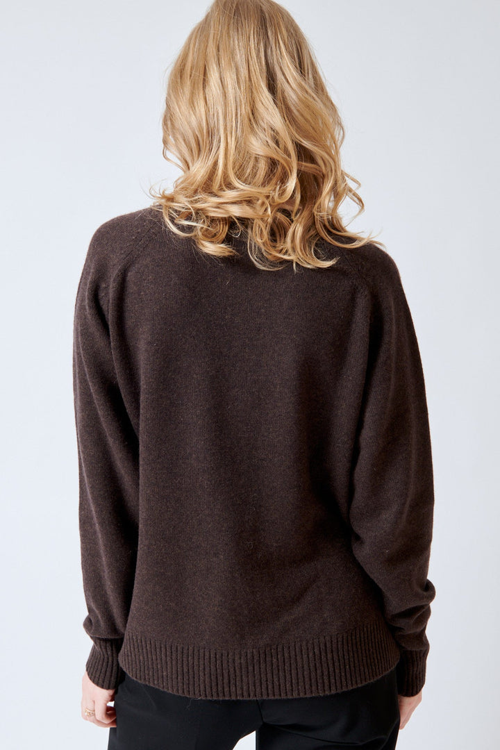 Madi wearing SPRWMN Classic Crew Sweater rear view