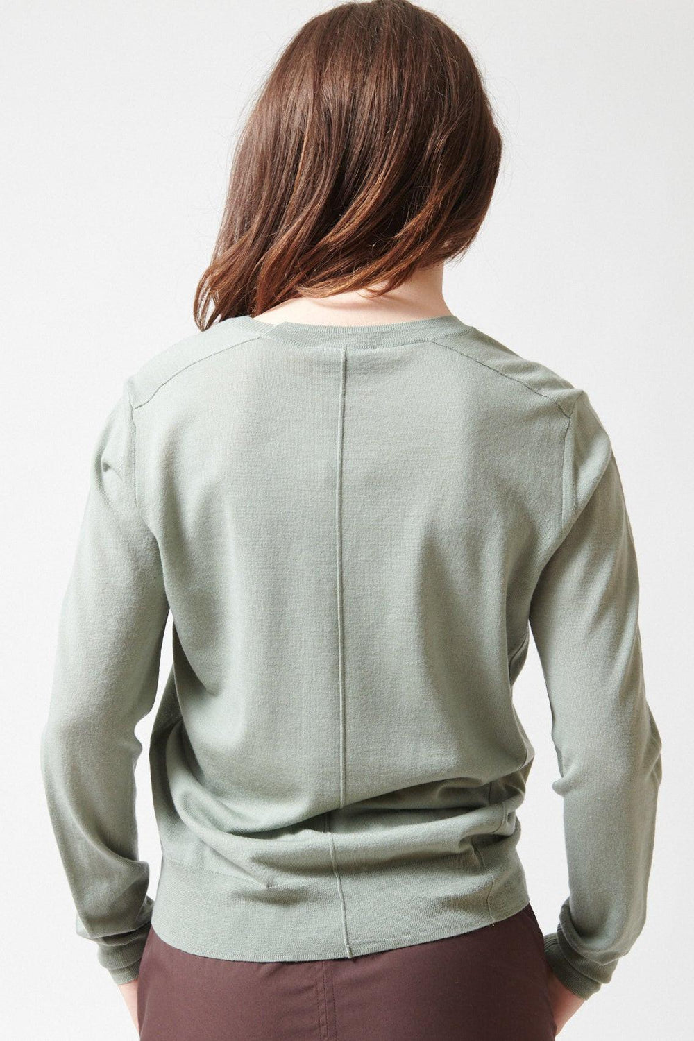 Sophie wearing Fine Merino Wool Aussie Jumper Mint rear view