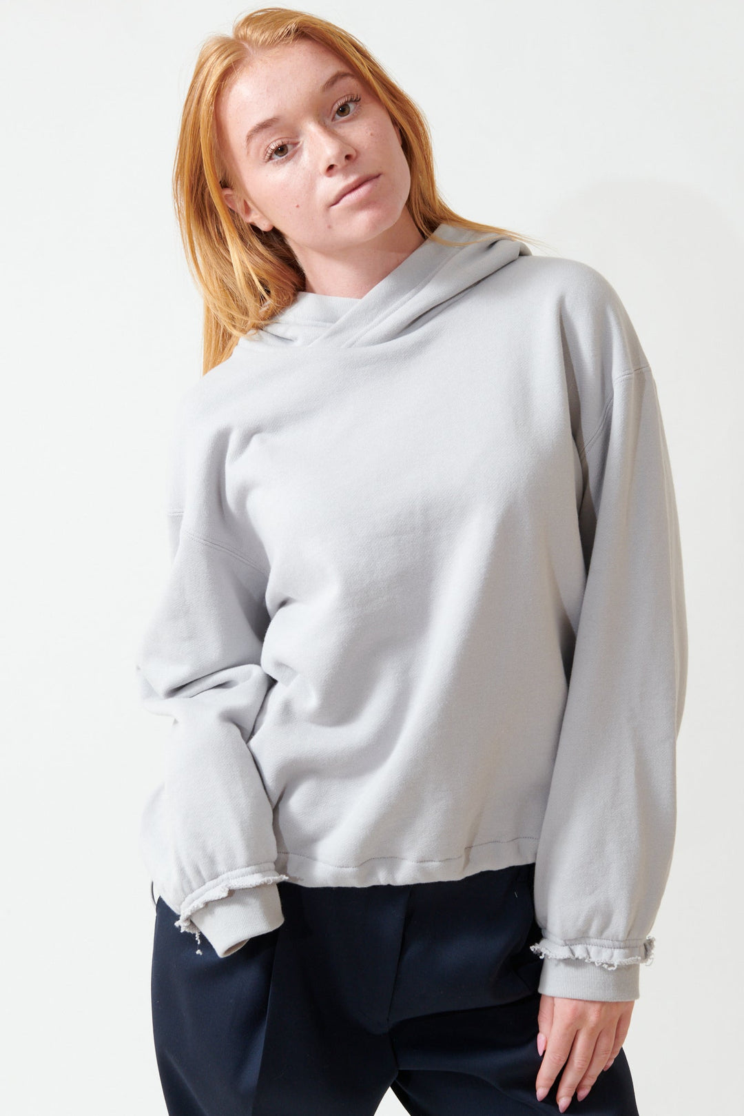 Aysia wearing WE-AR4 The Underground Hoodie front view