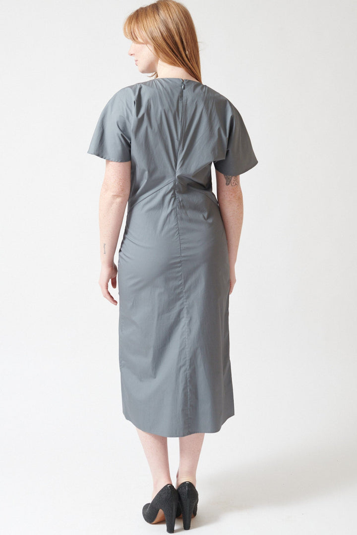 Waverly wearing soeur Organic Cotton Poplin Midi Length Ella Dress Grey Blue rear view