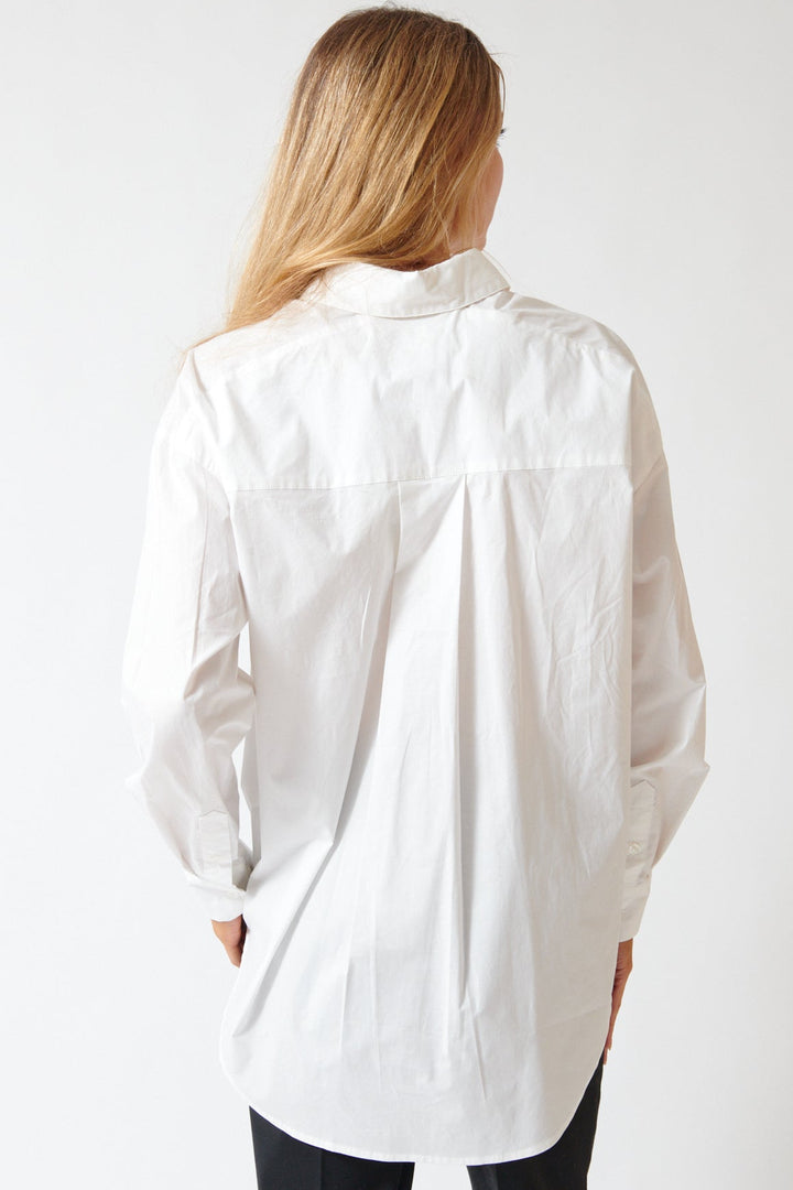 Mari wearing The Garment Cyprus Oversized Shirt rear view