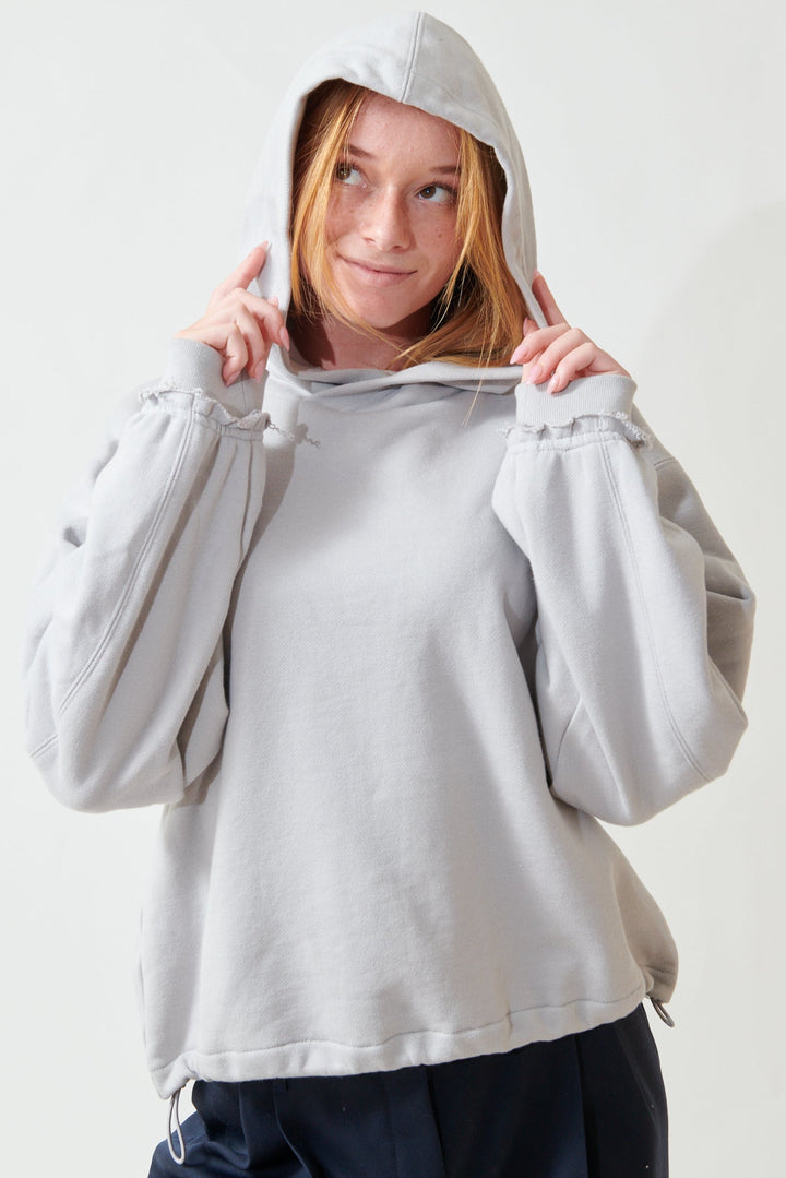 Aysia wearing WE-AR4 The Underground Hoodie front view