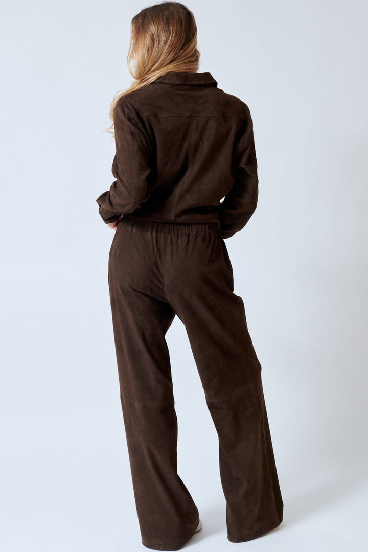 Mari wearing SPRWMN Kauai Pants rear view