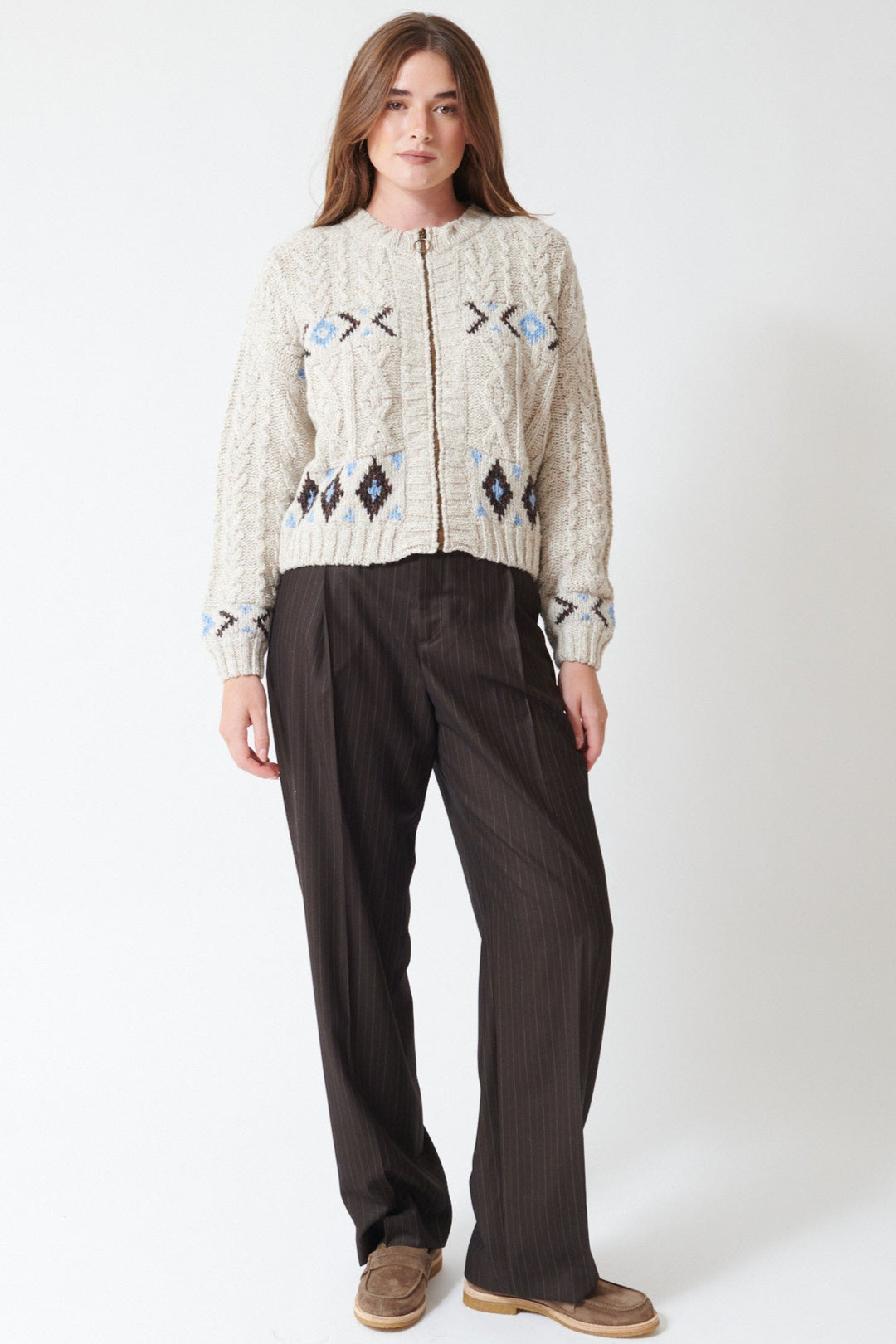 Julia wearing The Great The Menswear Trouser in Chocolate Stripe, front view.