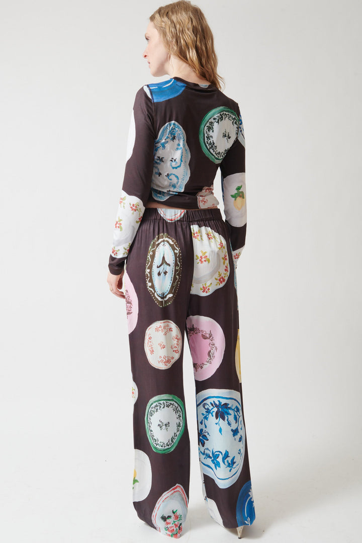 Madi wearing Stine Goya Dry Viscose Elasticated Long Pants rear view