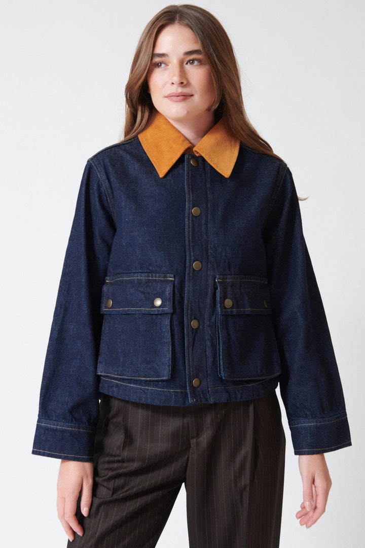 Julia wearing The Great The Denim Swingy Jacket in Midnight Rinse, rear view.