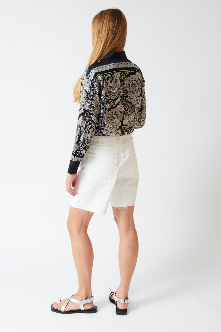 Mari wearing Nili Lotan Russel Denim Short rear view