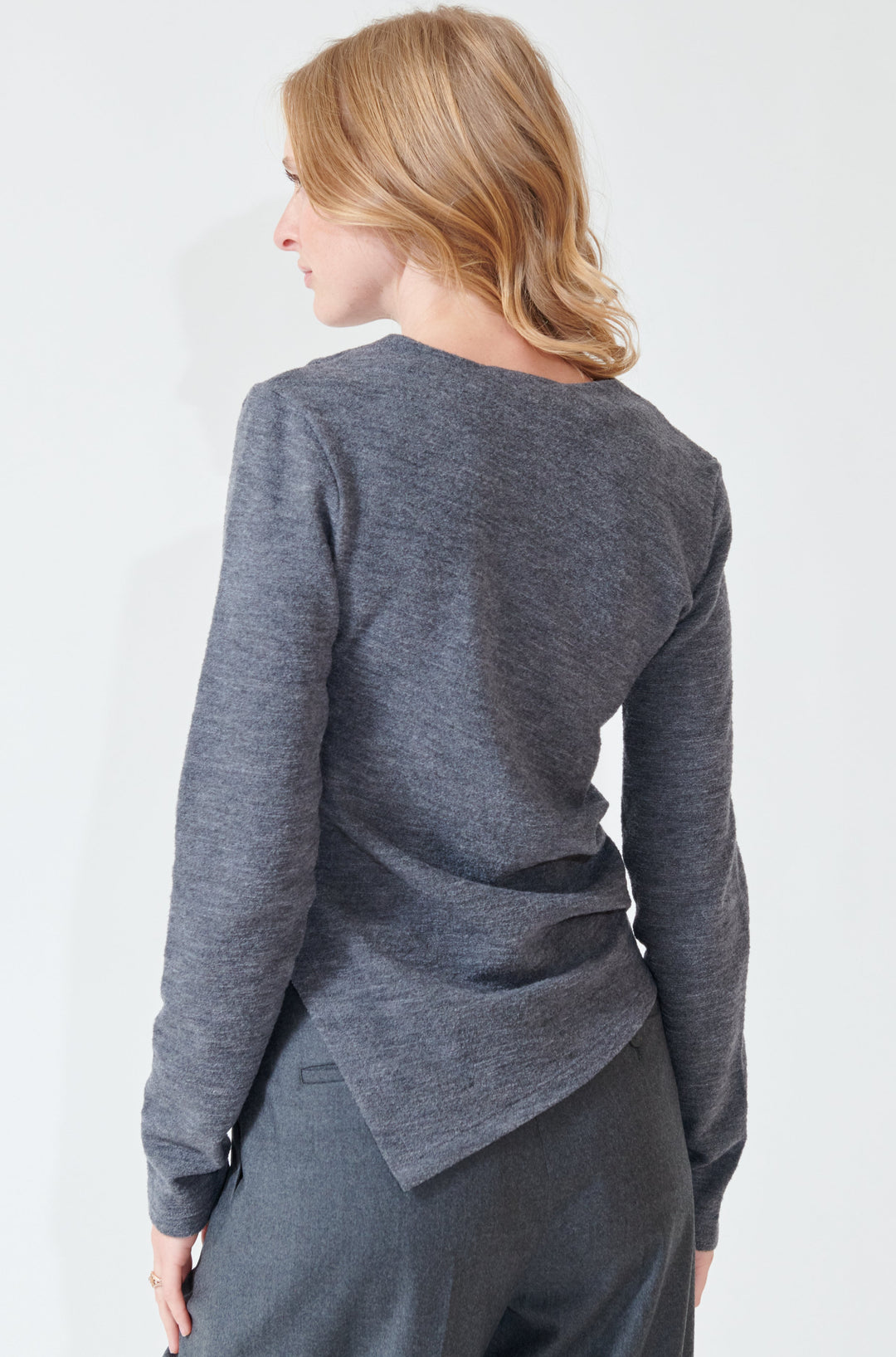 Madi wearing Róhe Reinvented Twisted Top rear view